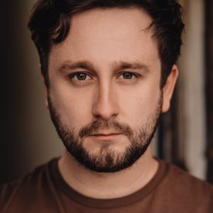 CONNOR</br>JONES” class=’img-responsive square’/>
													</div>
												
												<div class=